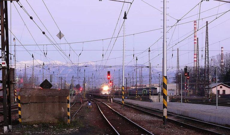 railway station evening travel transport track traffic lights wires electrified