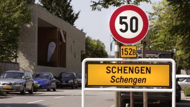 Place name sign Schengen name give for the Schengen Agreement, At the left in the background the Musee Europeen.